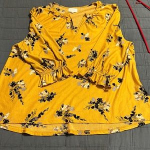 Mustard color floral shirt with mid length sleeves